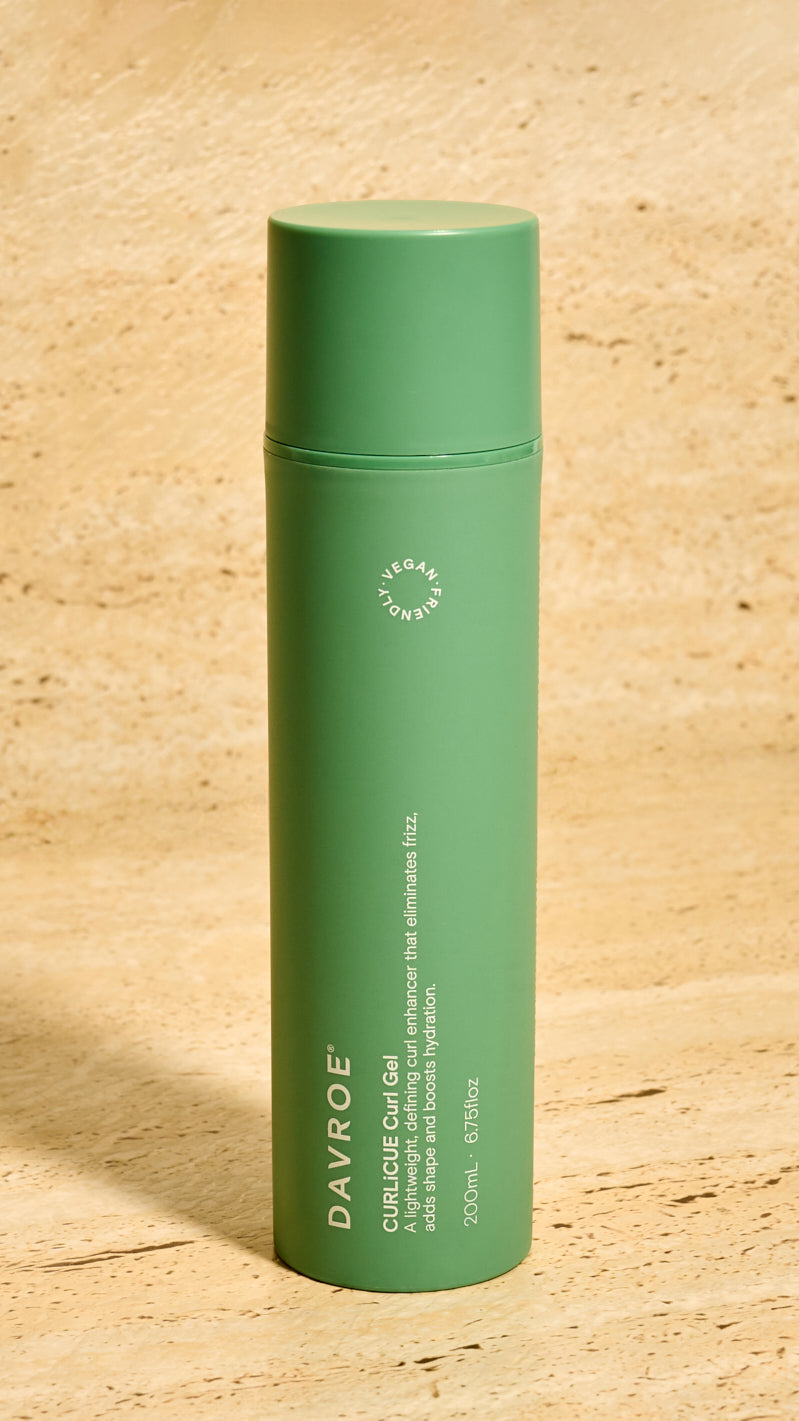Green bottle with 'Davroe' branding on a beige background
